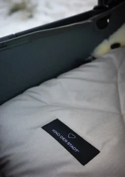 Premium Lammfell-Fußsack für Babywanne & Kinderautositz Limited Edition dune-beige